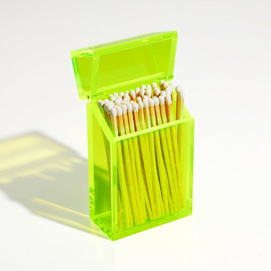 Opened Match holder shaped like a Cigarette Case. Made with neon green acrylic. Case holds White matches in it.